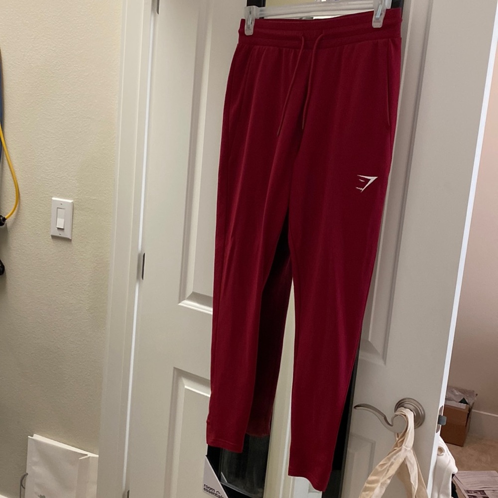 Gymshark Red Tapered sweatpants in Medium